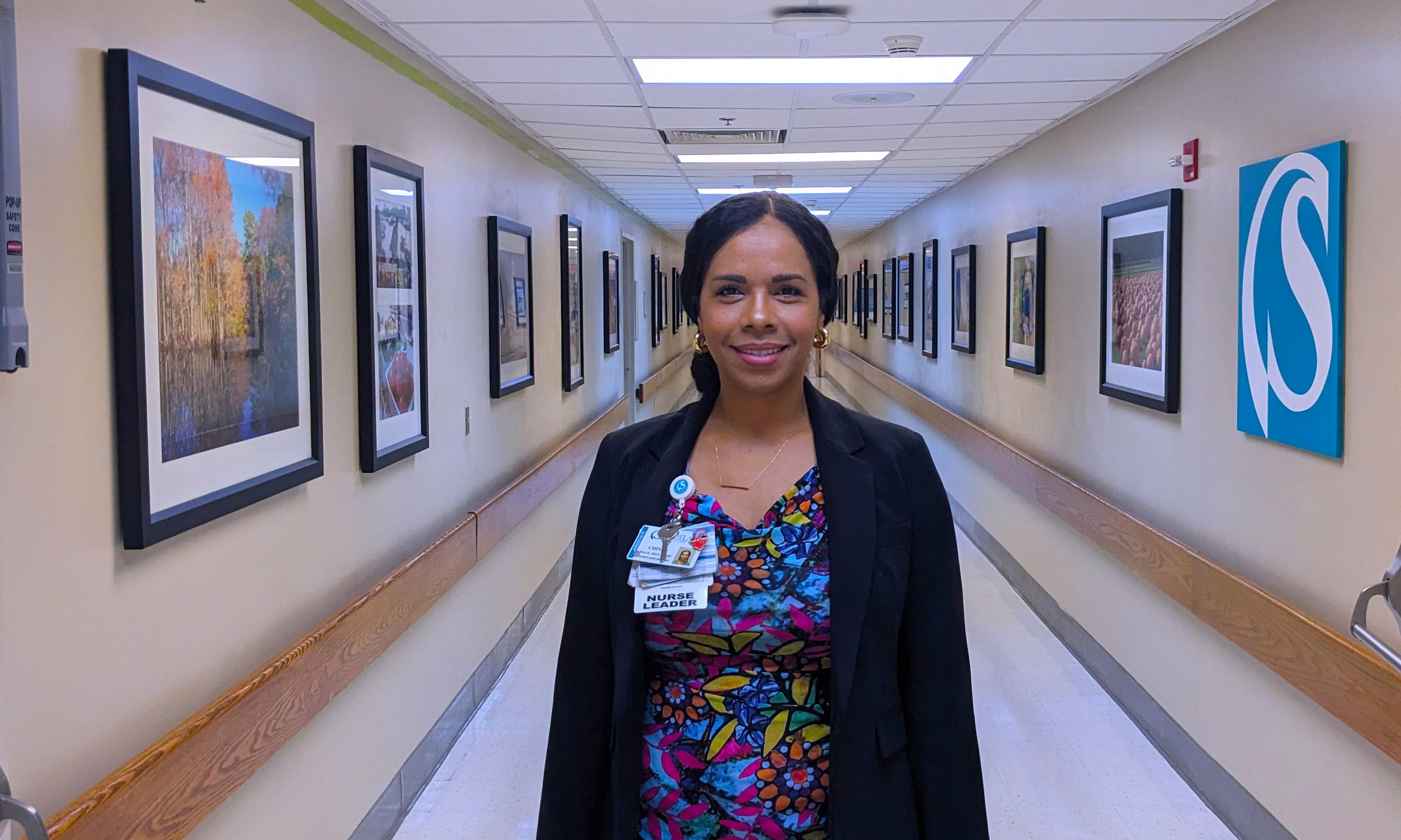 Chinna Hale standing in hallway of hospital